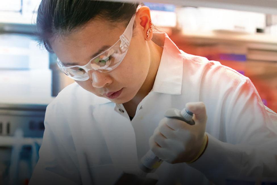 woman in white lab coat